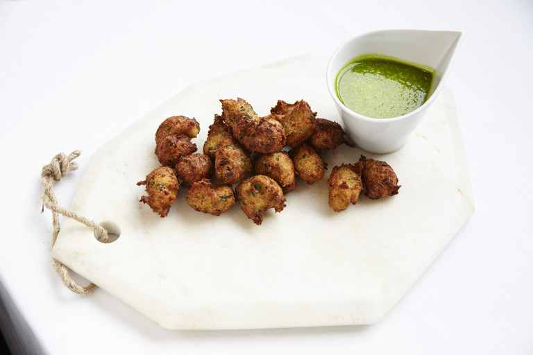 Crispy haddock doughnuts with lettuce and chilli oil sauce