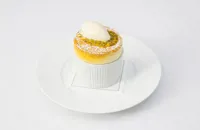Passion fruit soufflé with white chocolate ice cream