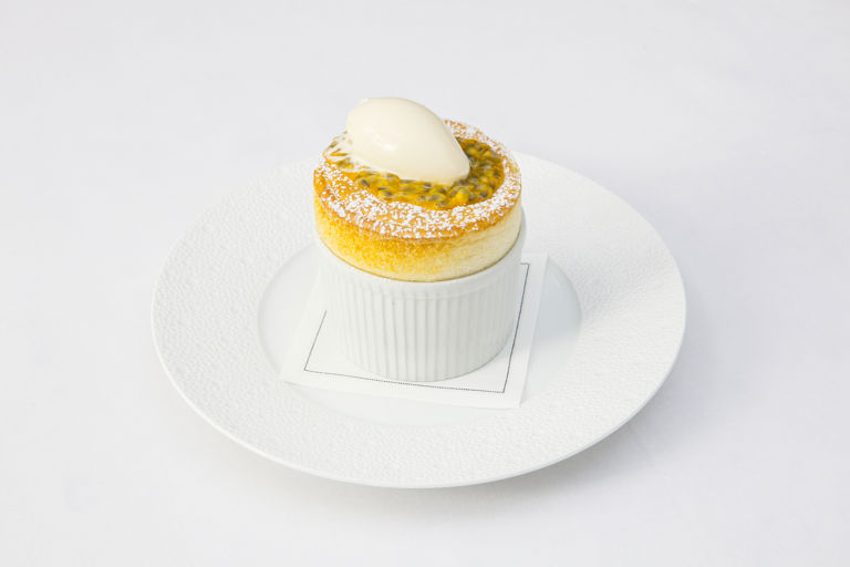 Passion fruit soufflé with white chocolate ice cream