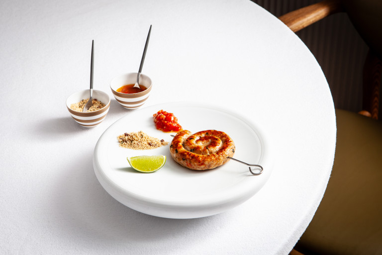 Chicken sausage with farofa and tomato vinaigrette