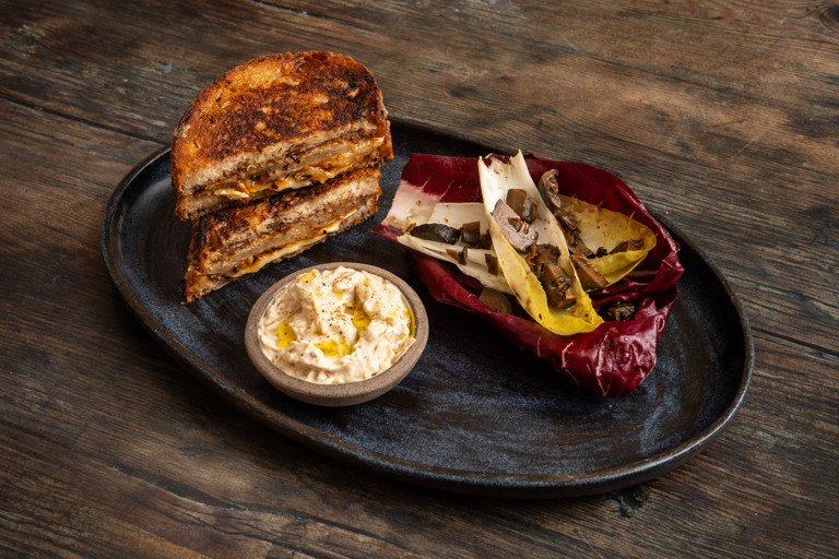 Buttered pear, brie and manchego toastie with onion crème fraîche