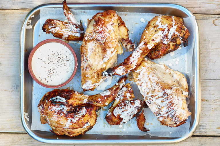 Barbecued chicken with Alabama white sauce