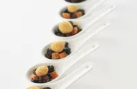 Macadamia nuts with black olives