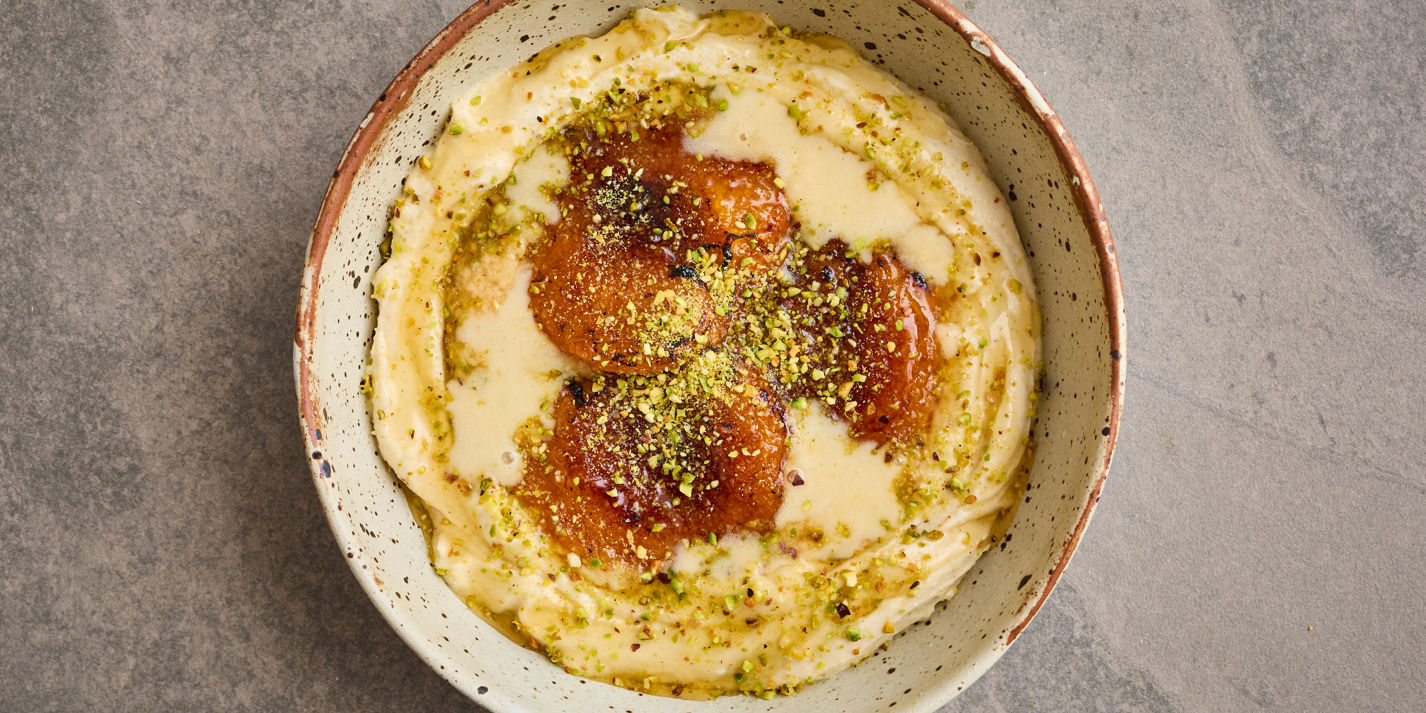 Caramelised apricots with tahini cream and pistachio crumb