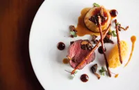 Sika deer with mashed swede, chanterelles and twiglets