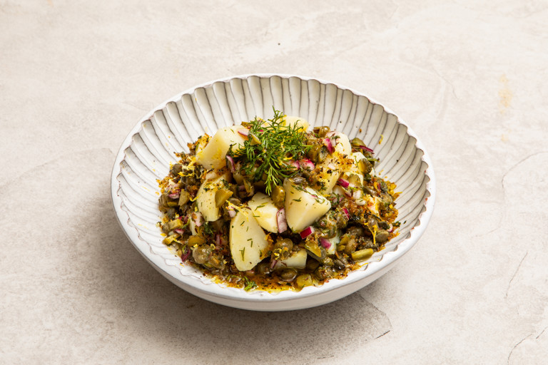 Warm potato salad with crispy herb pangrattato