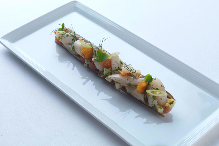Razor clams with spring onions and almond