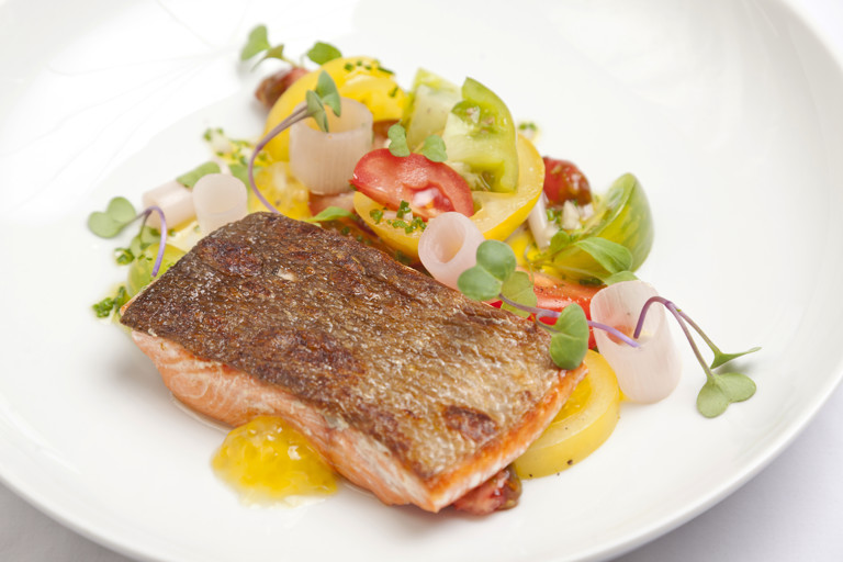 Seared Alaska salmon with heritage tomatoes