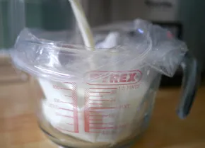 Pour the milk into a large, food-grade zip lock bag and stir in the salt