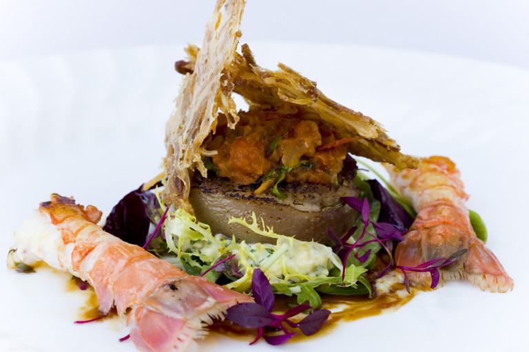 Rolled pig's head with langoustine and a crispy ear salad