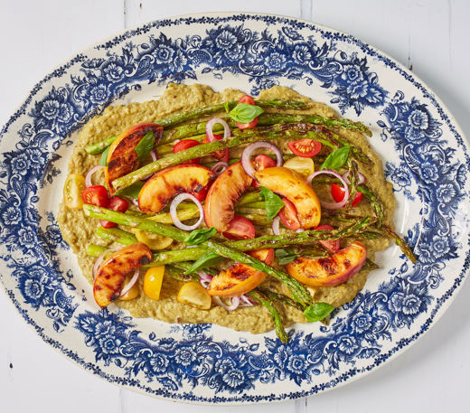 Green romesco sauce with charred peaches and asparagus