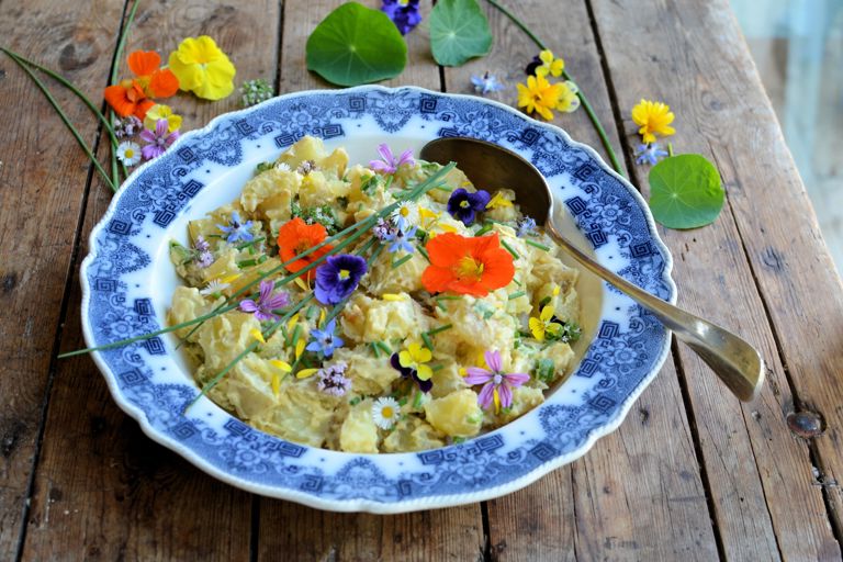 Provençal potato salad with truffle oil and edible flowers
