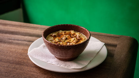 Cauliflower and coconut soup with toasted cumin, chilli butter and pine nuts