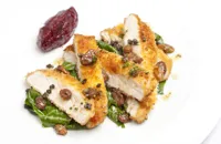 Turkey escalope with beetroot and caper chutney, golden raisins and pan juices
