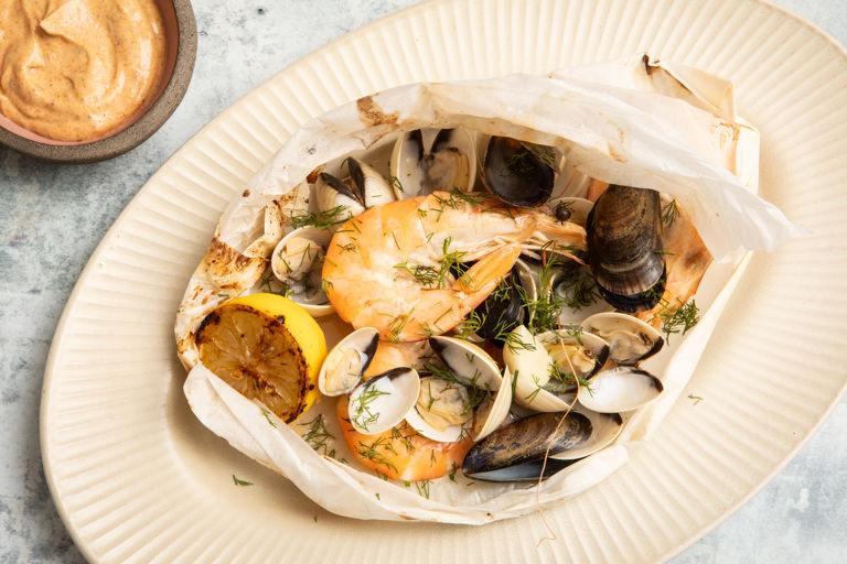 Seafood papillote with charred lemon and Old Bay remoulade