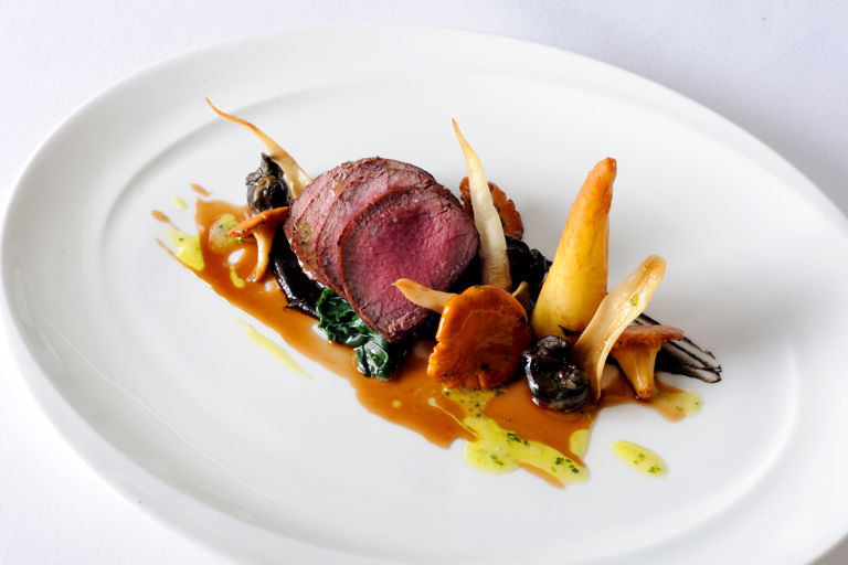Roasted loin of New Forest venison with snails, roasted chervil root and a field mushroom purée