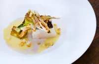Icelandic cod with roasted onion cream and artichokes