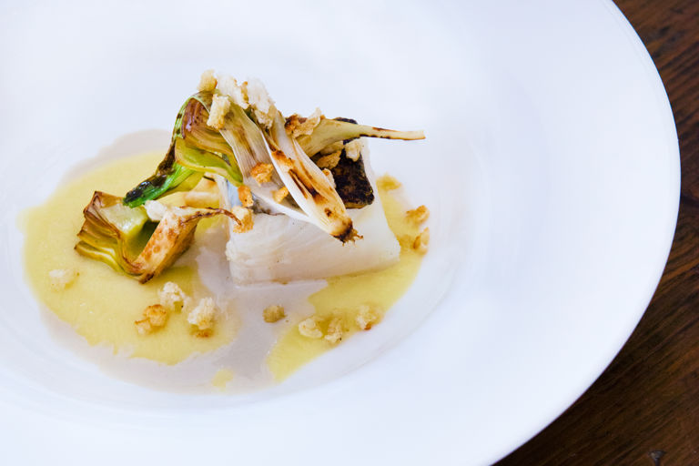 Icelandic cod with roasted onion cream and artichokes