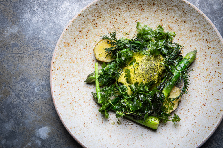 Asparagus with perfect poached egg, pink fir potatoes and seaweed hollandaise