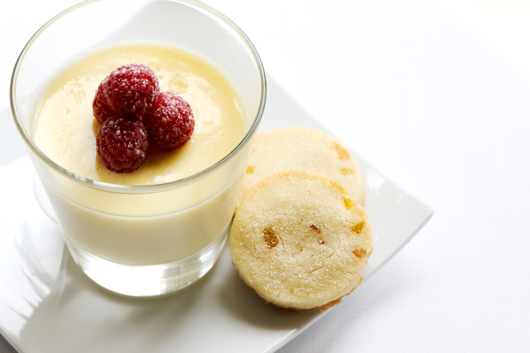 Lemon posset with raspberries and shortbread