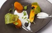 Organic carrots cooked in goat's whey with caviar, watercress and goat's curd