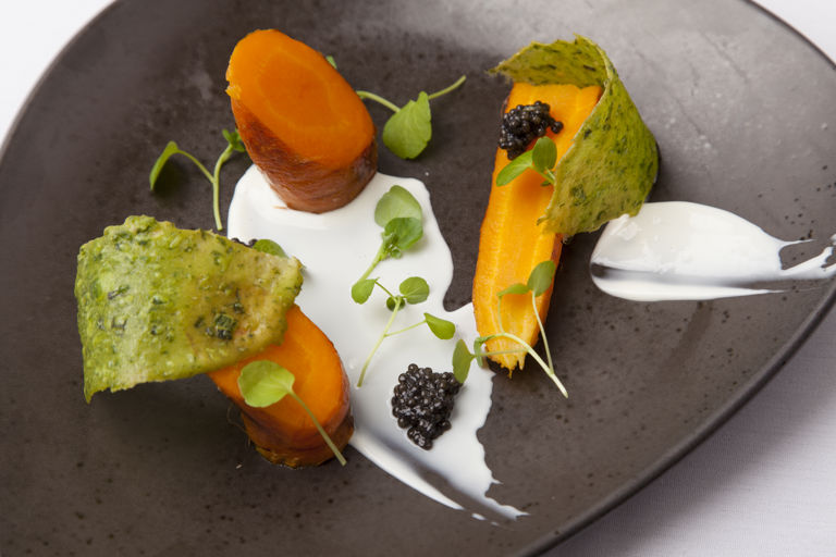 Organic carrots cooked in goat's whey with caviar, watercress and goat's curd
