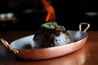 Christmas pudding with brandy butter