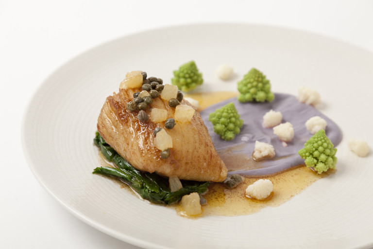 Pan-fried skate wing, purple cauliflower purée, pickled cauliflower and romanesco, caper and citrus butter sauce
