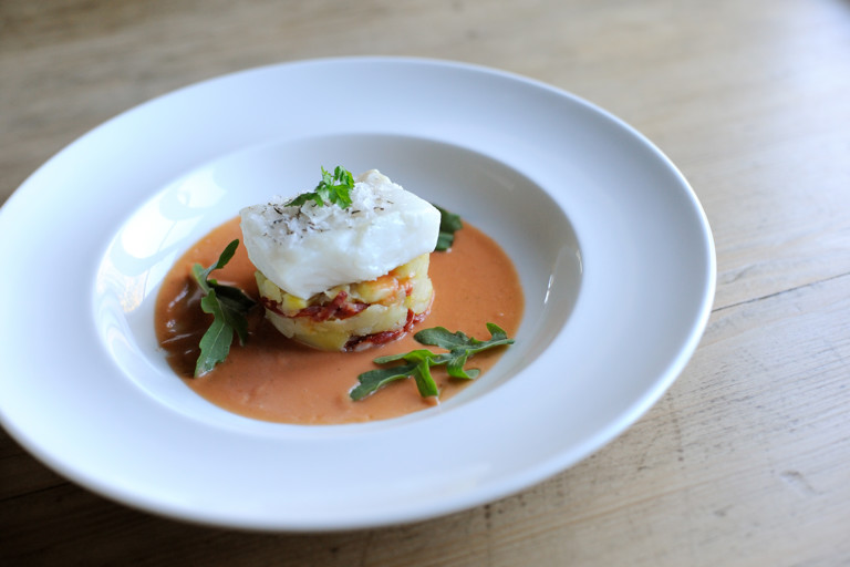 Salted cod with crushed potatoes, chorizo, tomato and thyme vinaigrette 