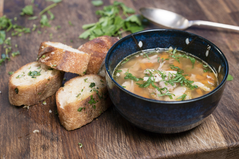 Chicken soup with tarragon garlic bread