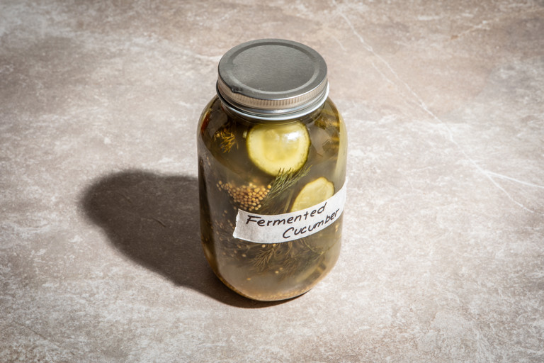 Fermented cucumber with mustard seeds and dill