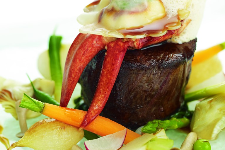 Jersey beef fillet with St Ouen’s Bay lobster ravioli and summer vegetables 