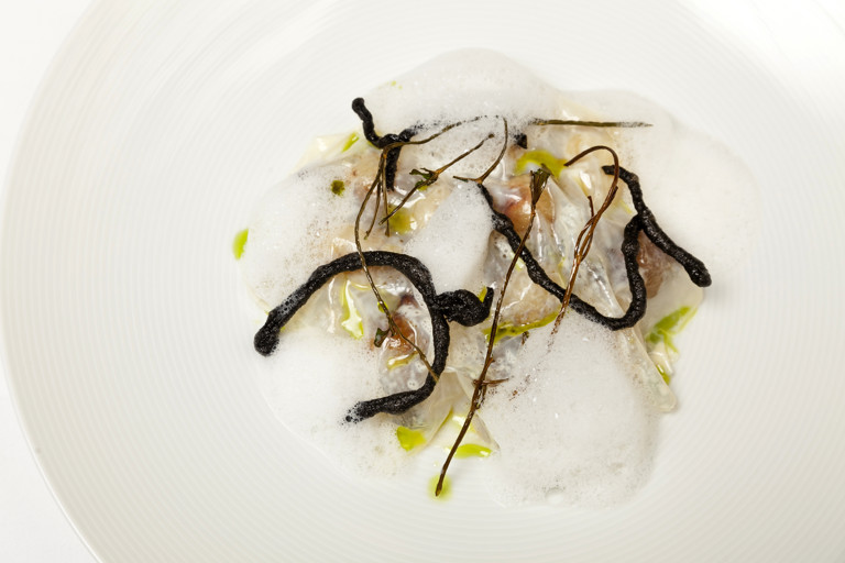 Jersey Royals with onions, milk skin and lovage