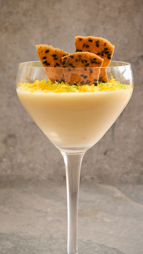 Yuzu posset with a black sesame tuile recipe reel